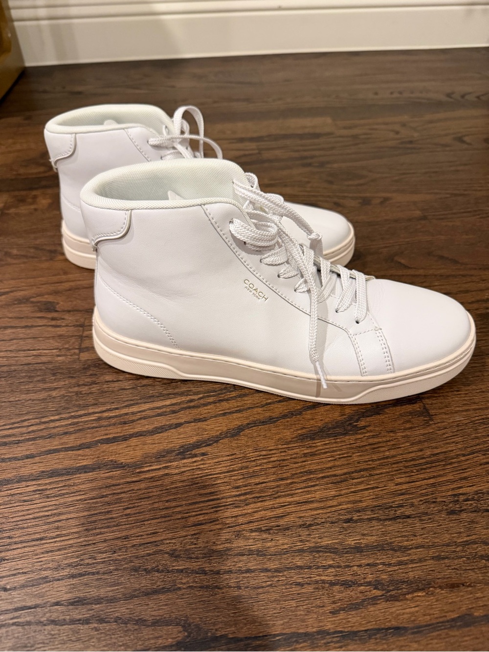 Coach All-White Leather High Top Sneakers